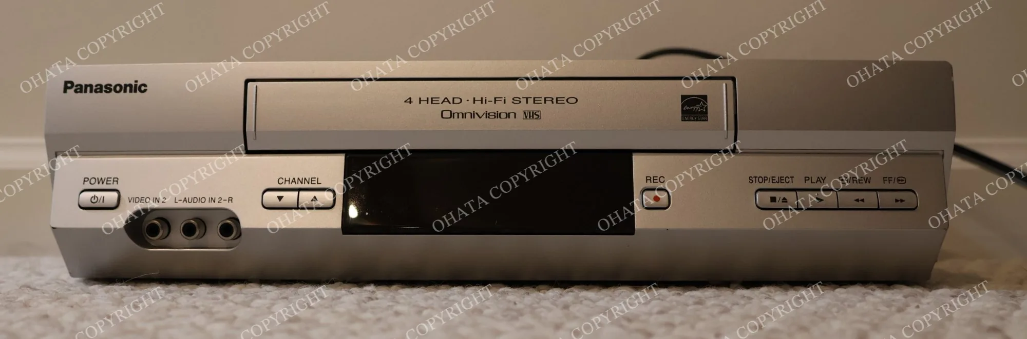Example of a VHS videocassette recorder. Check for tapes you want to keep before recycling. Reference image only.
