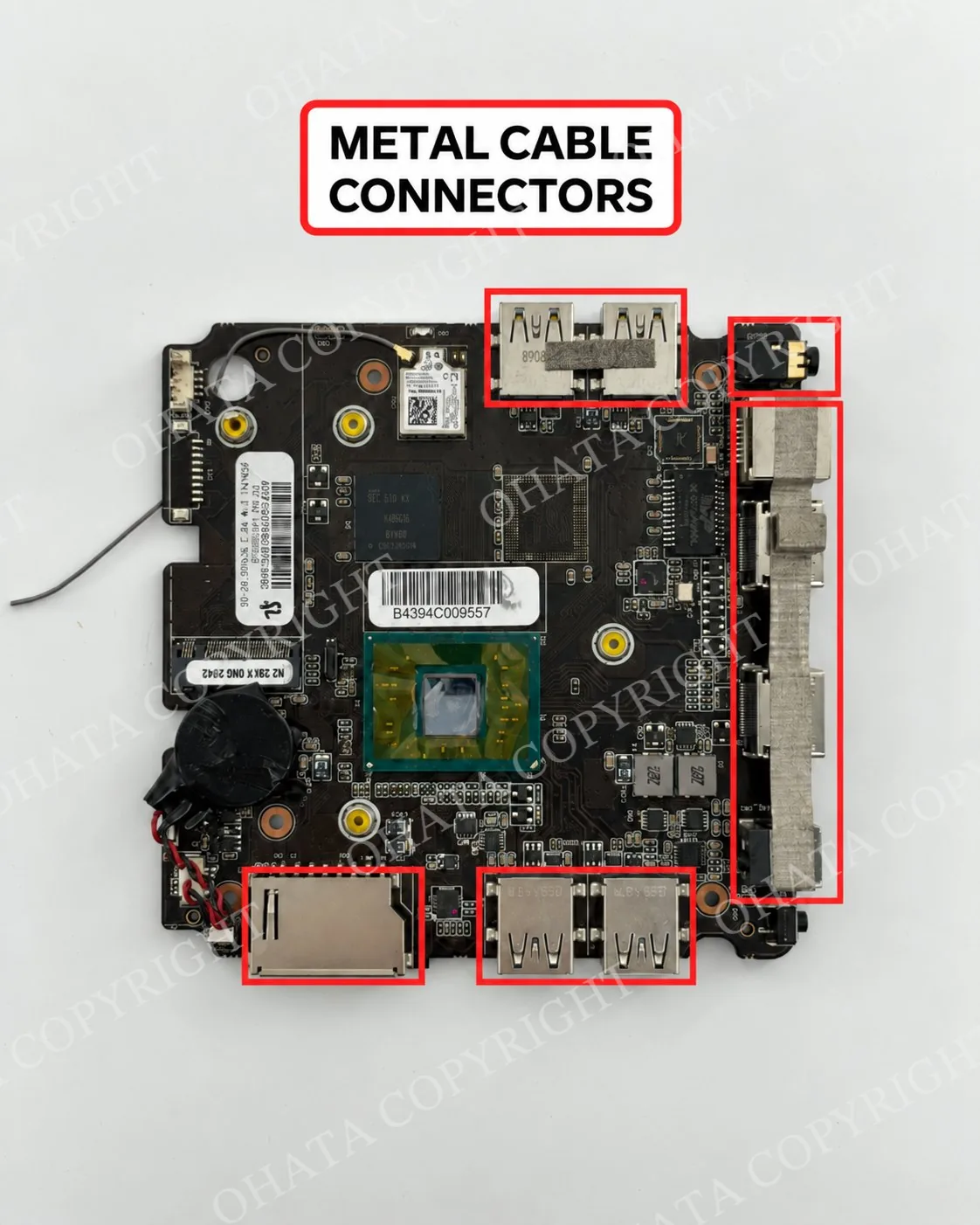 Compact circuit board with USB-style ports and other shielded external connectors outlined in red.