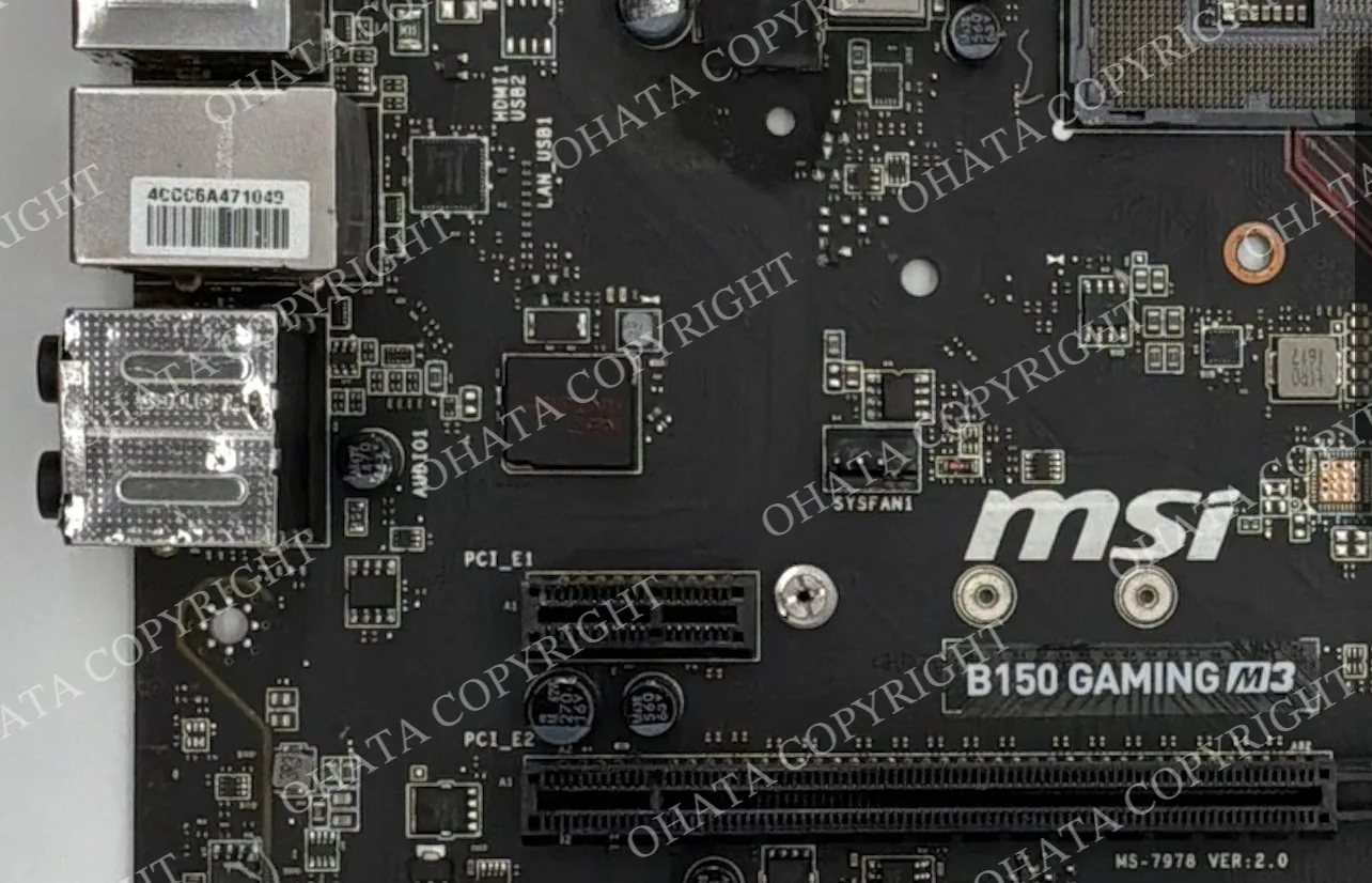 Close-up of MSI B150 Gaming M3 motherboard markings showing the model name and MS-7978 VER:2.0 PCB designation.
