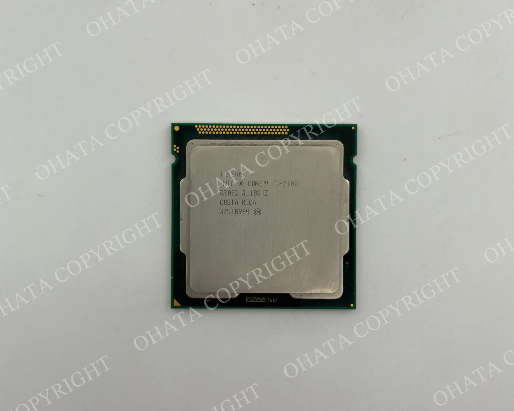 Top of an Intel Core i5 processor showing its silver-colored metal heat spreader and identification markings.