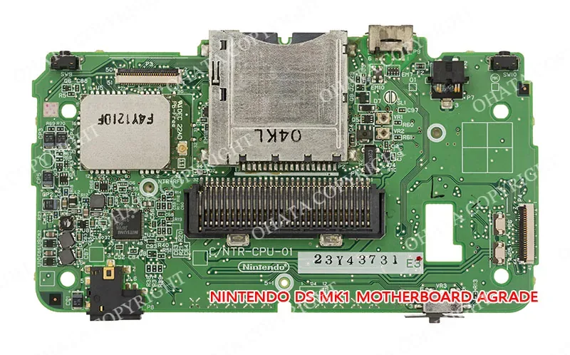 Nintendo DS Mk1 motherboard with processor, memory, cartridge connector, and other surface-mounted components.