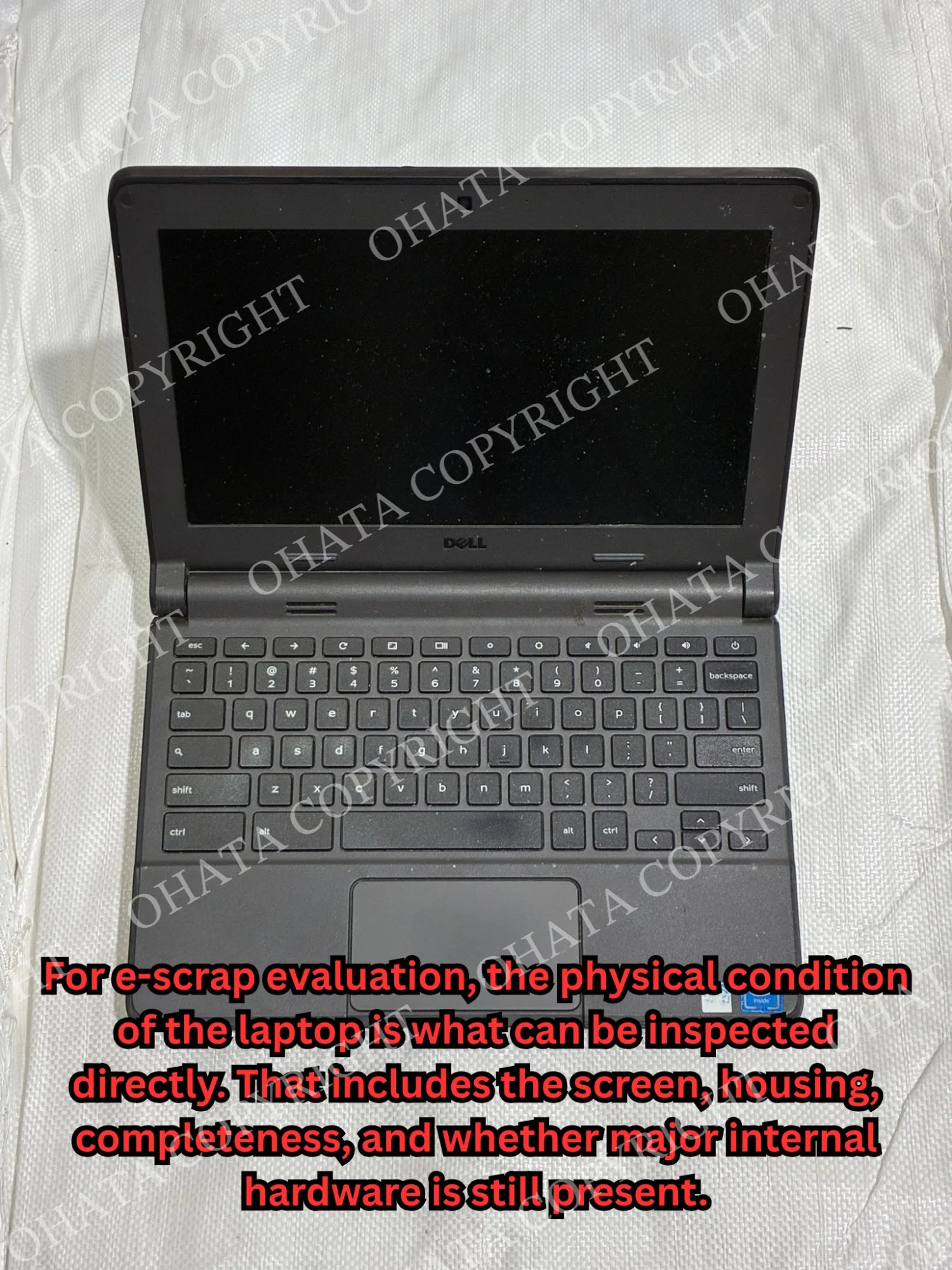 Open Dell Chromebook showing the screen, keyboard, housing, and overall physical condition of the laptop.