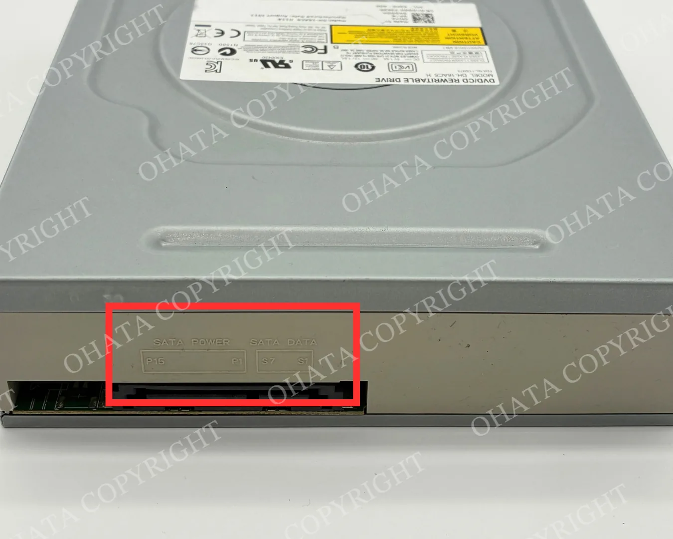 Rear view of a desktop DVD rewritable drive showing the SATA power and SATA data connectors.