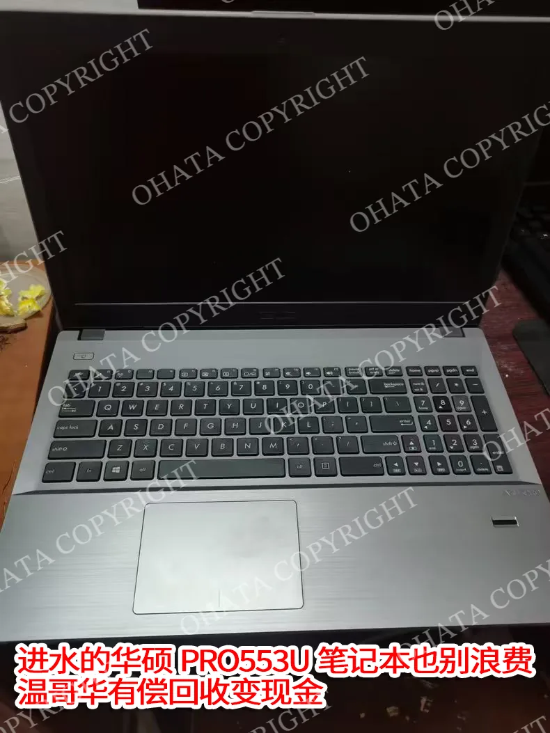 Unbranded silver laptop with the lid open