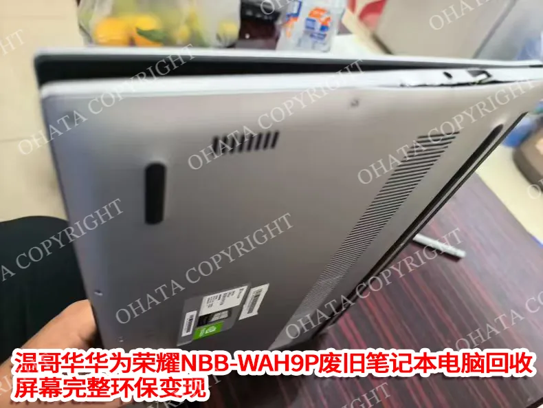 Side view of the Huawei Honor NbB wah9p laptop